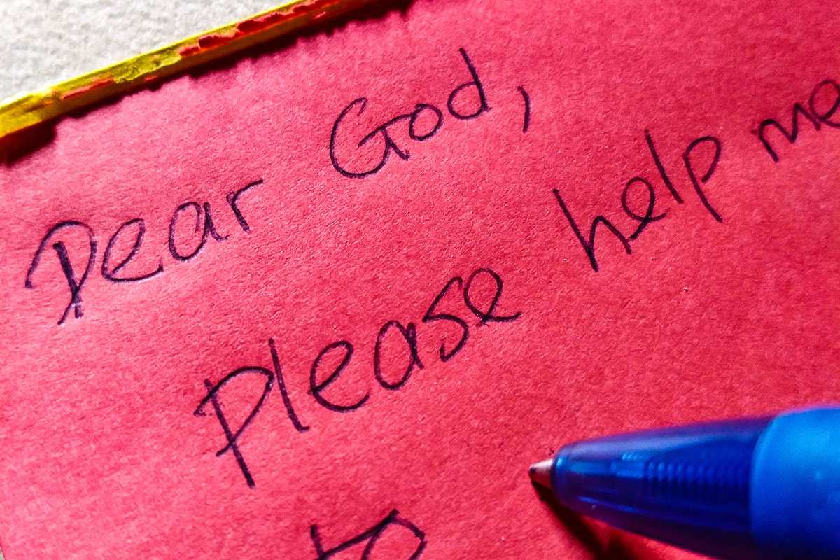 Hand-written note to God reading 'Please help me to…,' symbolizing the hope and healing offered through Deer Hollow’s mental health therapies, such as EMDR, cognitive processing therapy, and schema therapy.