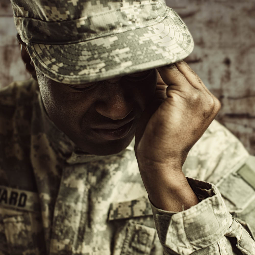 Stressed soldier struggles to reintegrate emotionally after a long foreign deployment; Deer Hollow offers PTSD treatment and veteran mental health services to address trauma and addiction for holistic recovery.